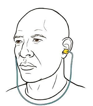 Man wearing earplugs.